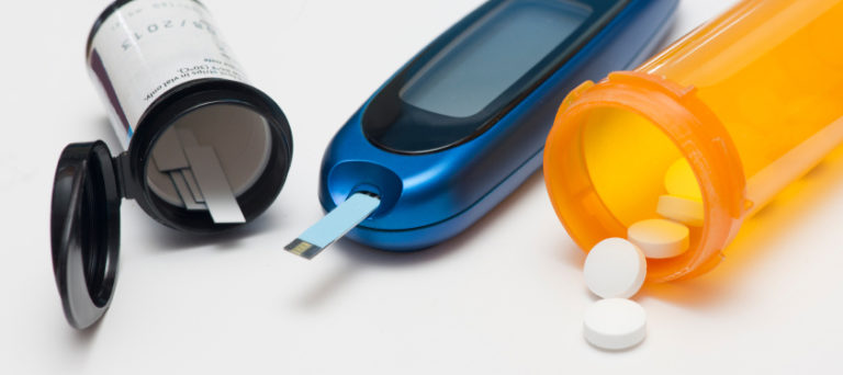 Glucometer, test strips, and diabetes medication.