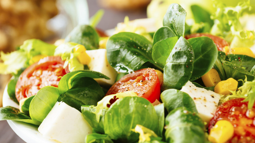 Salad with tomatoes on a plate